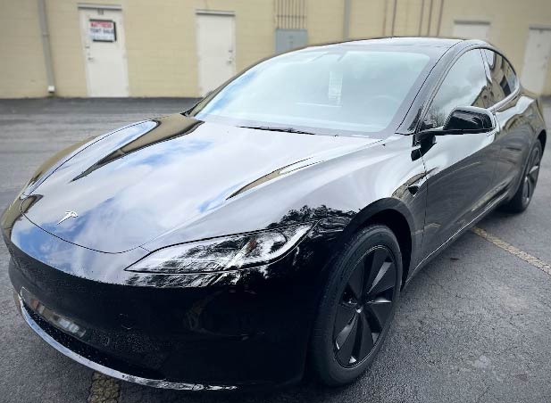 black tesla window tint installation one hour turbo tint kenesaw